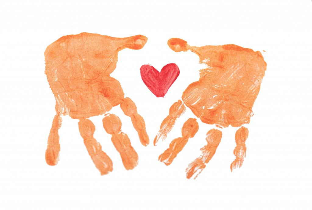 A child’s hands imprint showing their love